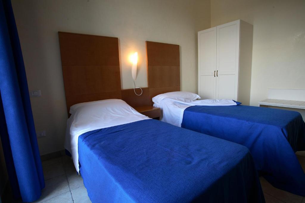 Hotel Resort Portoselvaggio Сант-Исидоро Номер фото